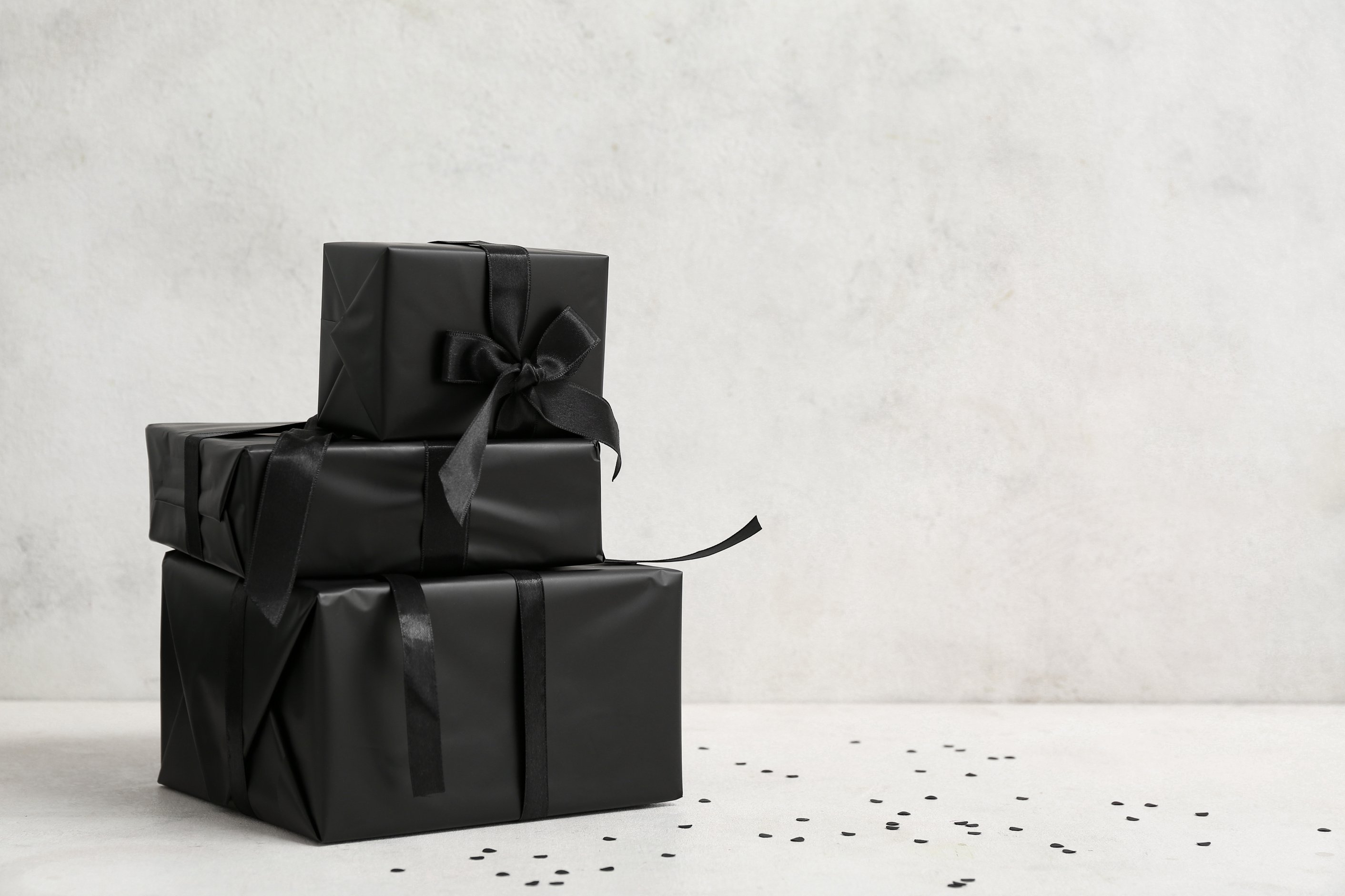 Black Gift Boxes on White Background