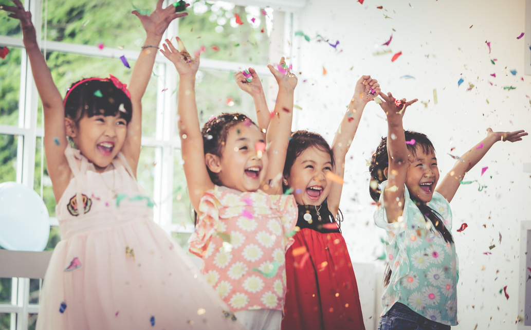 Kids are playing and throwing paper in kid party